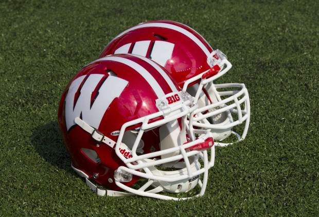 2013-wisconsin-new-red-football-helmets-620x423.jpg